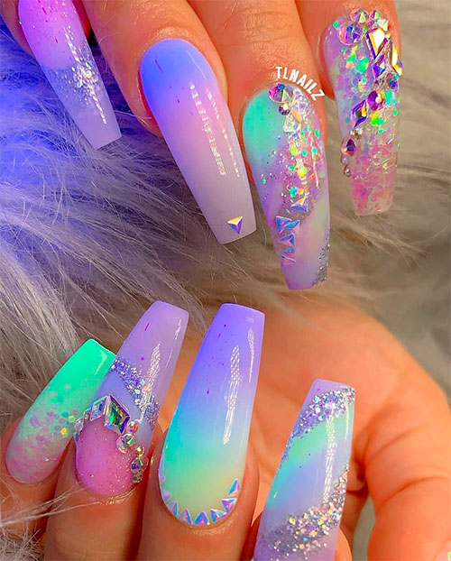 Beautiful holographic unicorn nails are so attractive!