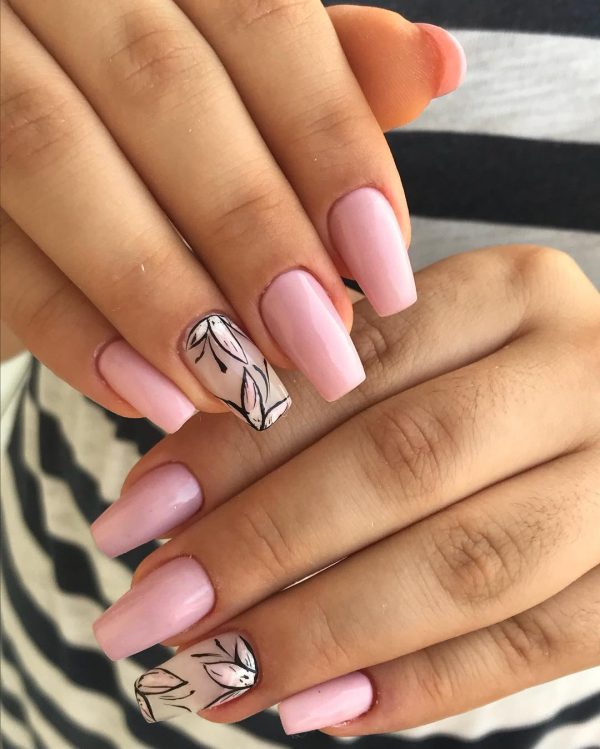 Amazing baby pink coffin nails with accent nude floral nail!