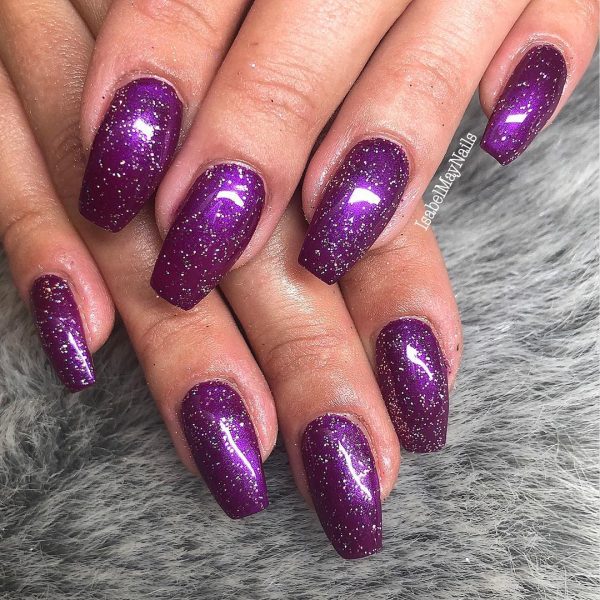 Beautiful glitter purple coffin nails!