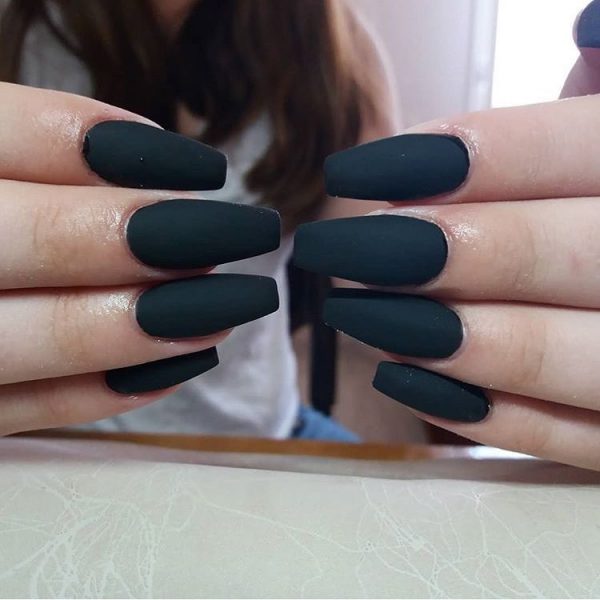 Amazing matte black ballerina nails.