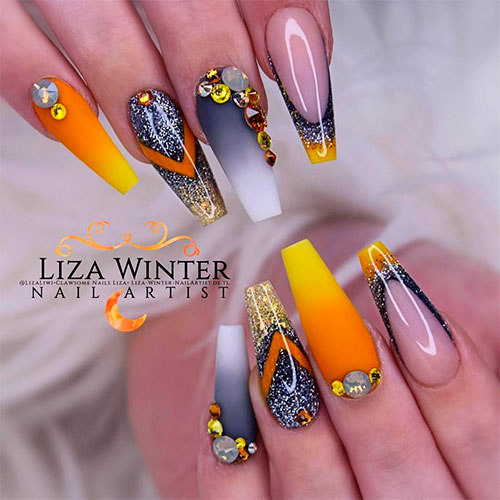 Gorgeous ombre glitter coffin nails between glossy and adorned matte nails