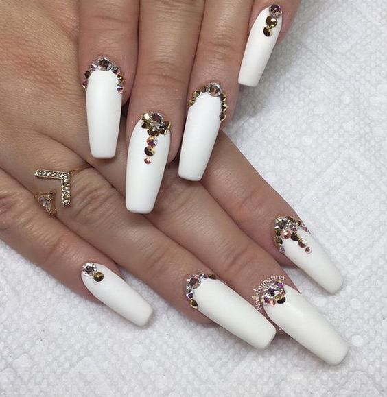 Gorgeous matte white coffin nails with rhinestones