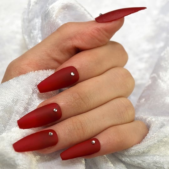 Matte red acrylic coffin nails with rhinestones set, one of the best red coffin nails ideas