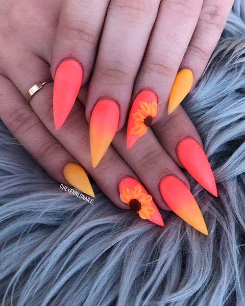 Amazing orange and yellow ombre nails with an accent sunflower nails
