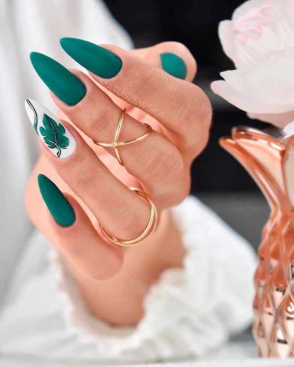 green almond spring nails 2019 design with a beautiful teal leaf on an accent white almond nail worn with white dress