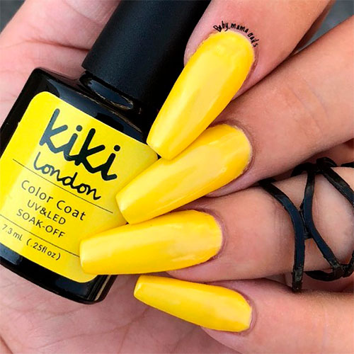 Cute glossy summer yellow acrylic nails coffin