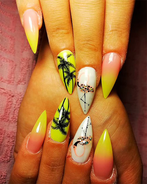 Gorgeous yellow stiletto summer nails with an accent white flamingo nail