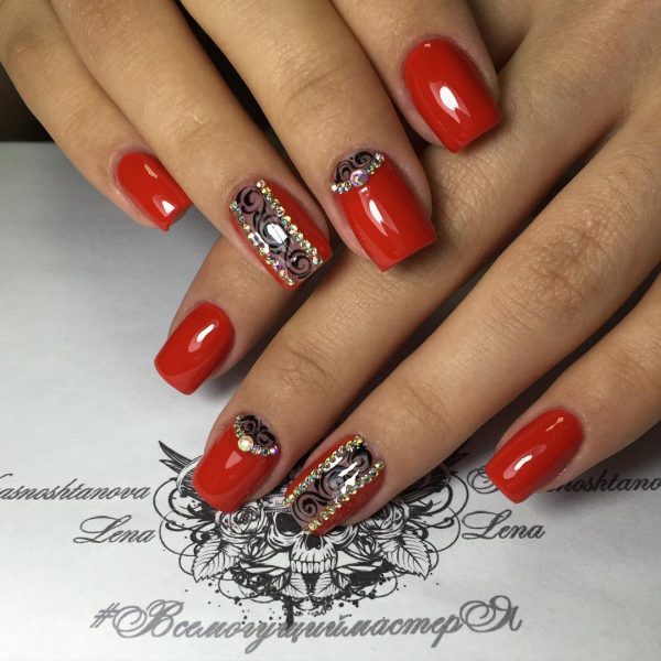 Red nails with black polish using nail sticker’s vinyl a and rhinestones, Red nails and an accent red nail with amazing black rhinestones