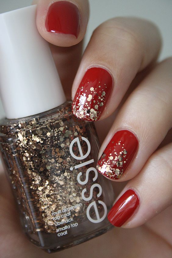 Red nails with gold glitter on two nails, red and gold nails