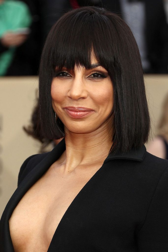 Bob hairstyle idea 3 - Amanda Brugel with a blunt bob haircut and bangs