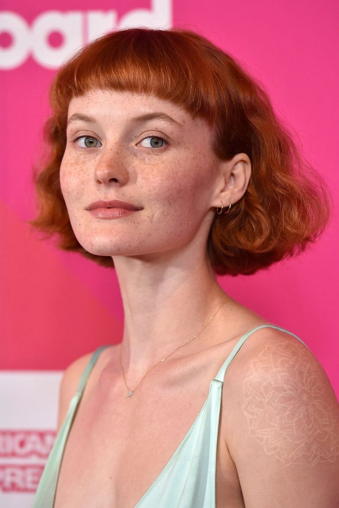 Bob hairstyle idea 12 – Kacy Hill with curly bob haircut and bangs