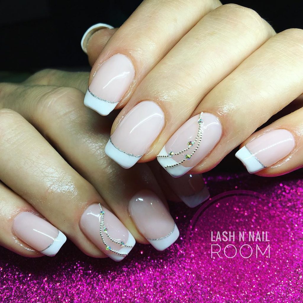 Amazing French tip nails with Beads, Crystals, and glitter