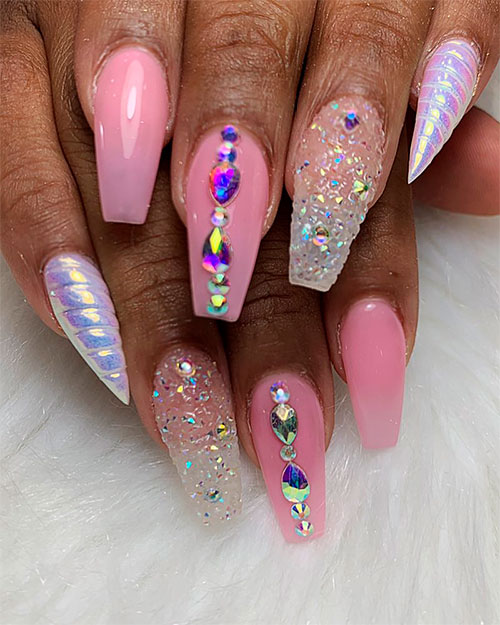 Amazing unicorn coffin shaped nails with two pinky fingernails in unicorn horn style!