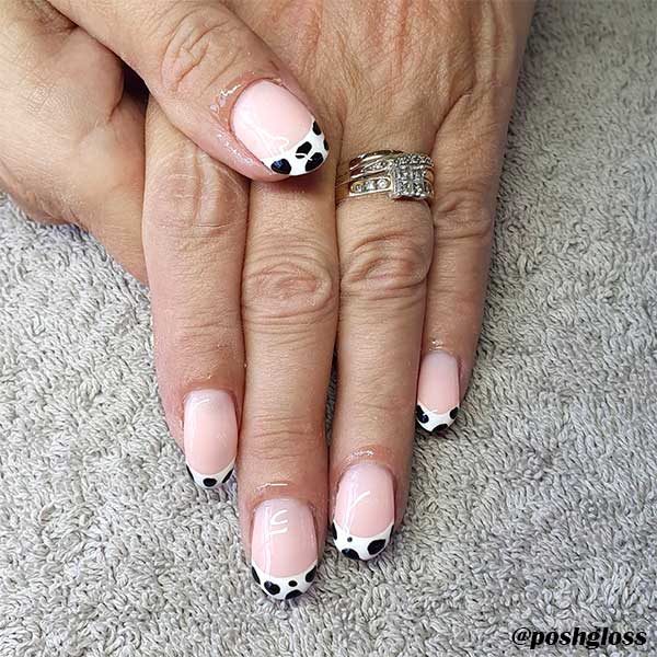 Cute cow print round short French tip nails design
