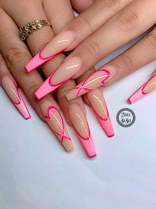 Valentine’s Pink French Manicure Long coffin shaped valentine’s French nails 2023 with glitter dark pink outlines and heart shapes on accent nails