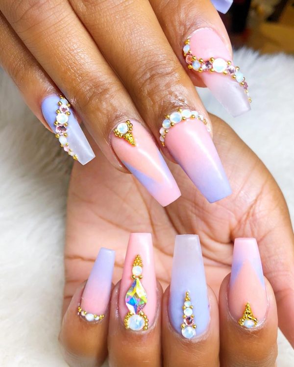 Stunning unicorn nails with diamonds!