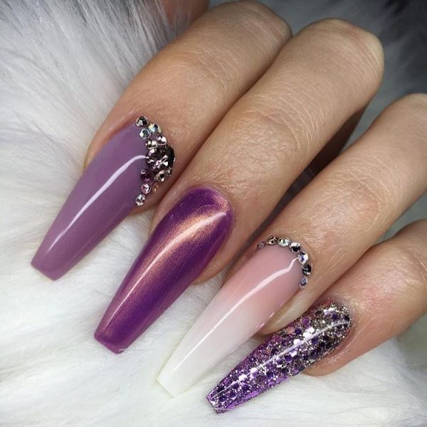 Stylish long coffin shaped unicorn nails!