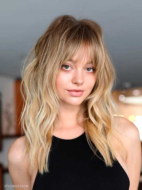 shoulder length hairstyle for fine hair with bangs and long layers for adding volume