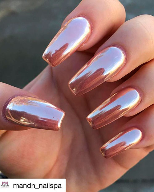 Cute rose gold chrome long coffin nails! Cute long coffin shaped rose gold pink chrome nails