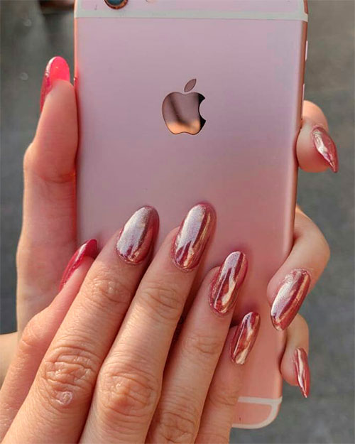 Cute oval shaped rose gold chrome nails