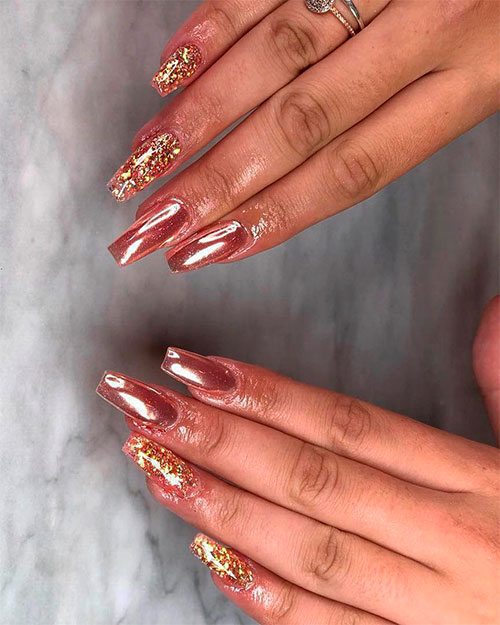 Gorgeous rose gold chrome long coffin nails with glitter nails on two accent nails