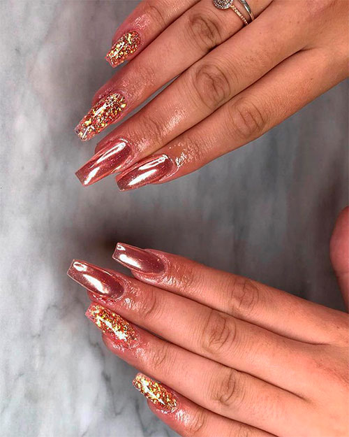 Gorgeous rose gold chrome long coffin nails with glitter nails! Gorgeous rose gold chrome long coffin nails with glitter nails on two accent nails