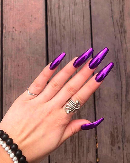 Long Purple chrome coffin nails on white hand with index finger ring and pinky finger ring!