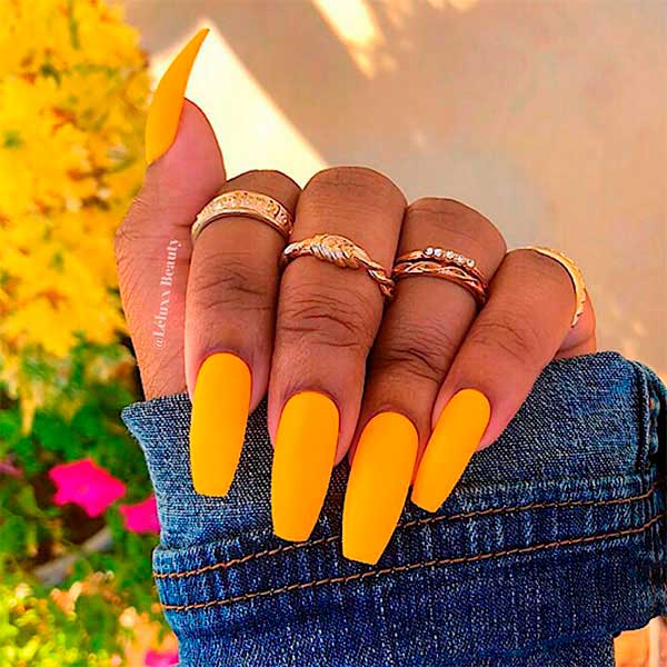 Cute mustard yellow matte coffin nails long with gold rings for women