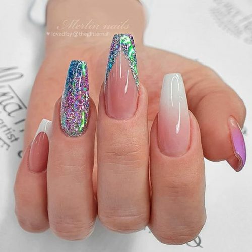 Cute mixed color coffin nails between colorful glitter, nail art french v glitter tip, white v shaped french nail, French ombre nail, and purple ombre nail design! 