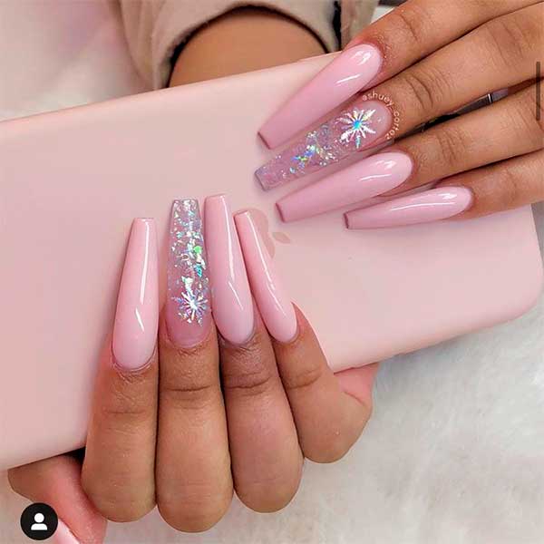 Gorgeous baby pink coffin shaped nails with accent glitter nail for inspiration!