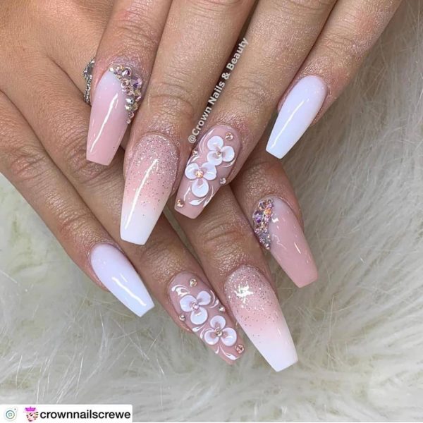 Nice pink and white glitter ombre nails!