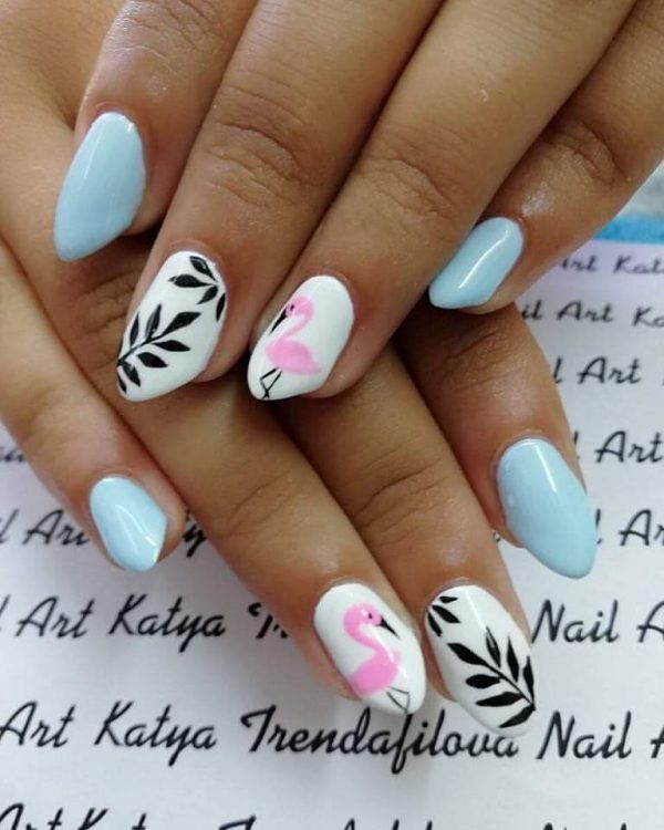 Stunning light blue summer nails with leaf nail and flamingo nail