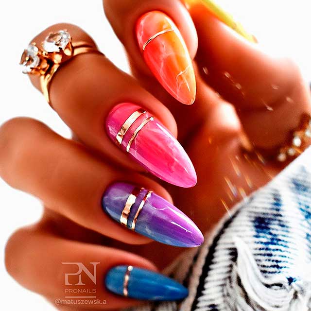Fancy multi colored nails set which, consists of cute colorful ombre marble summer nails with golden foil strips design!