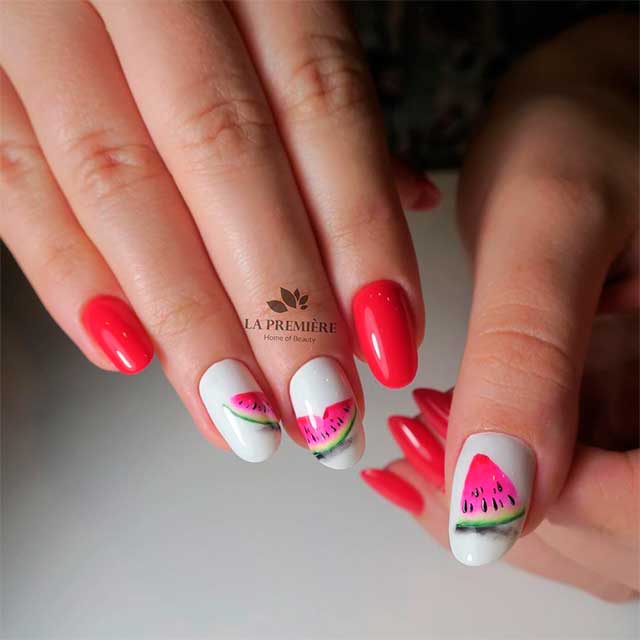 Stunning watermelon nails design on white round nails with red round nails set! Stunning watermelon nails design on white round nails with red round nails set!