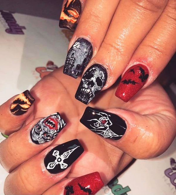 Amazing black Halloween nails, are really one of the creepiest Halloween nail designs
