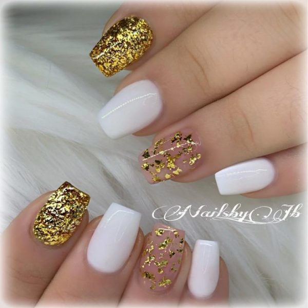 Amazing white short coffin nails with golden glitter nails!