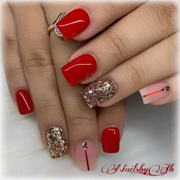 Beautiful red short acrylic nails with gold glitter & nude nails!