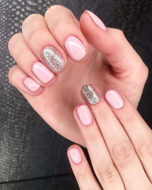 Cute short acrylic nails light pink with an accent silver glitter nail!