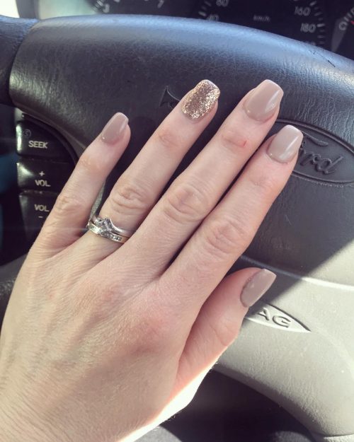 Stunning Coffin Nude Color Nails with Golden Glitter Accent Nail
