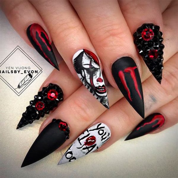 Vampire Stiletto Halloween Nails are one of the most creepy Halloween nail designs