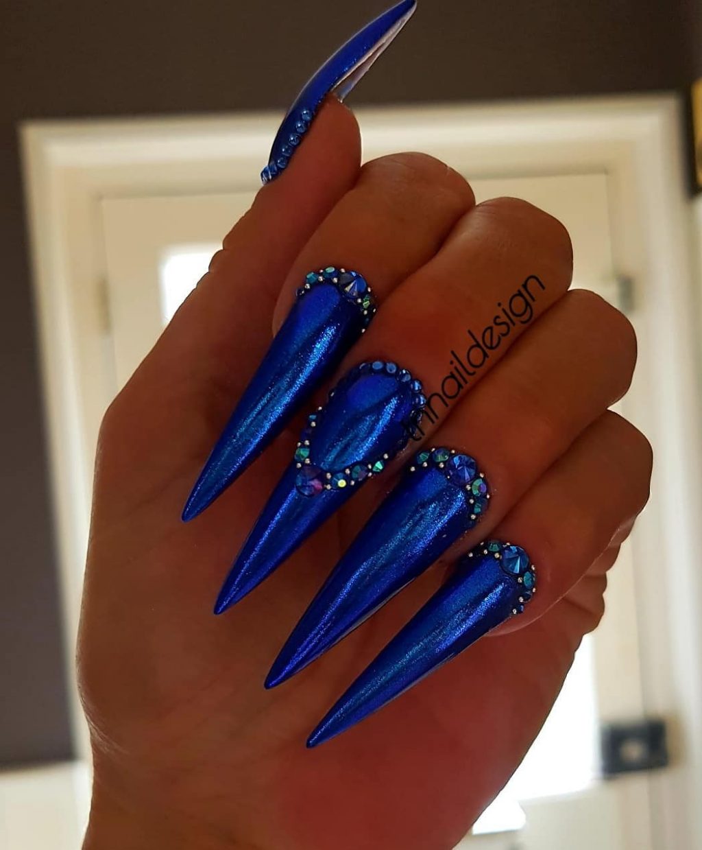 Beautiful Dark Blue Stiletto Fall Nails with rhinestones