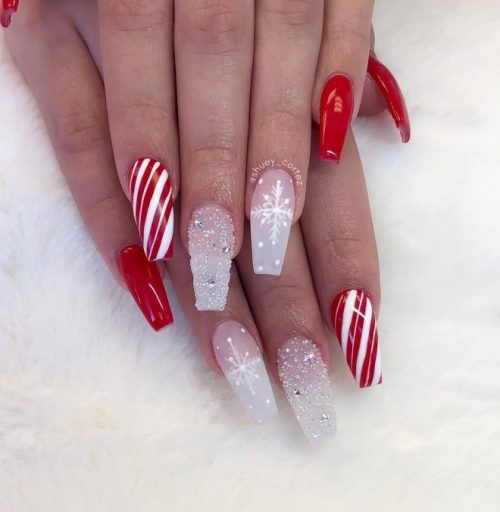 Beautiful glitter, candy cane, snowflake, and red Christmas nails!