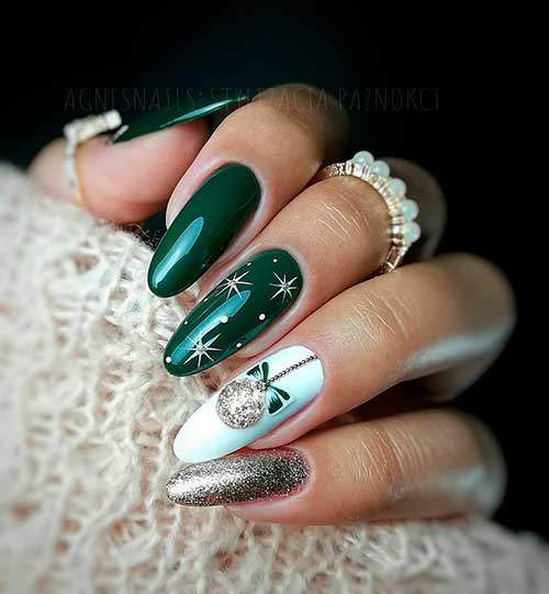 Beautiful green Christmas nails with white snowflakes and glitter design!