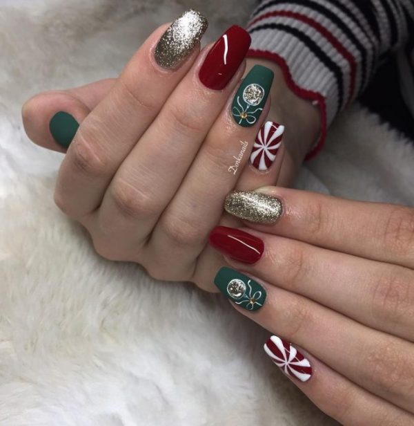 Wonderful gold glitter, candy cane, green, and red Christmas nails!