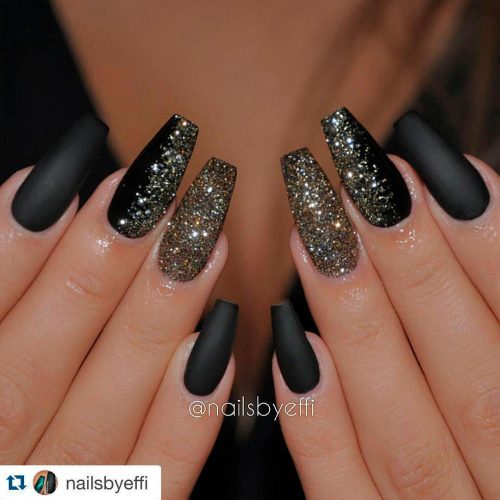 Gorgeous black matte coffin nails with gold glitter nails