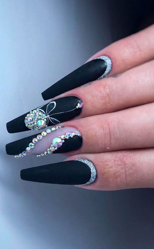 Cute matte coffin nails with rhinestones and two reverse silver glitter nails!
