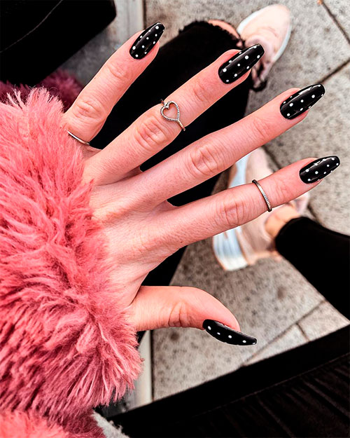 Cute black coffin nails with white dots!