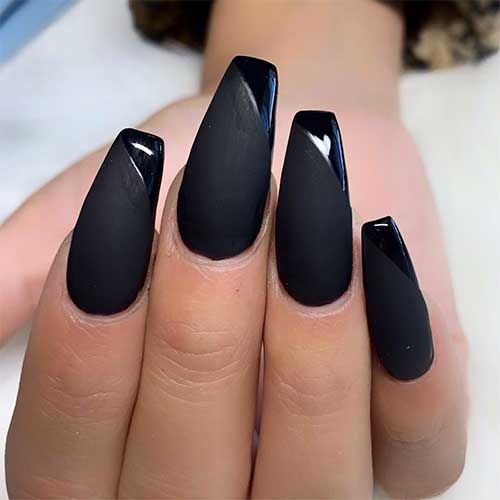 Cute matte black coffin nails with shiny tips!