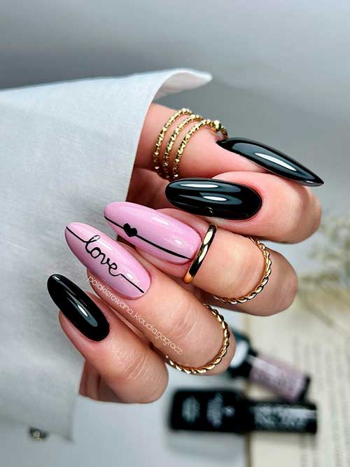 Love Black Nails Long glossy black nails 2023 with nude pink accent nails adorned with love letters to celebrate Valentine's Day