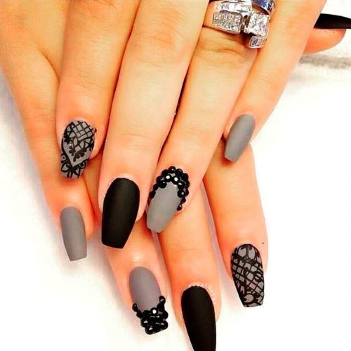 gray and black matte coffin nails with some black rhinestones!